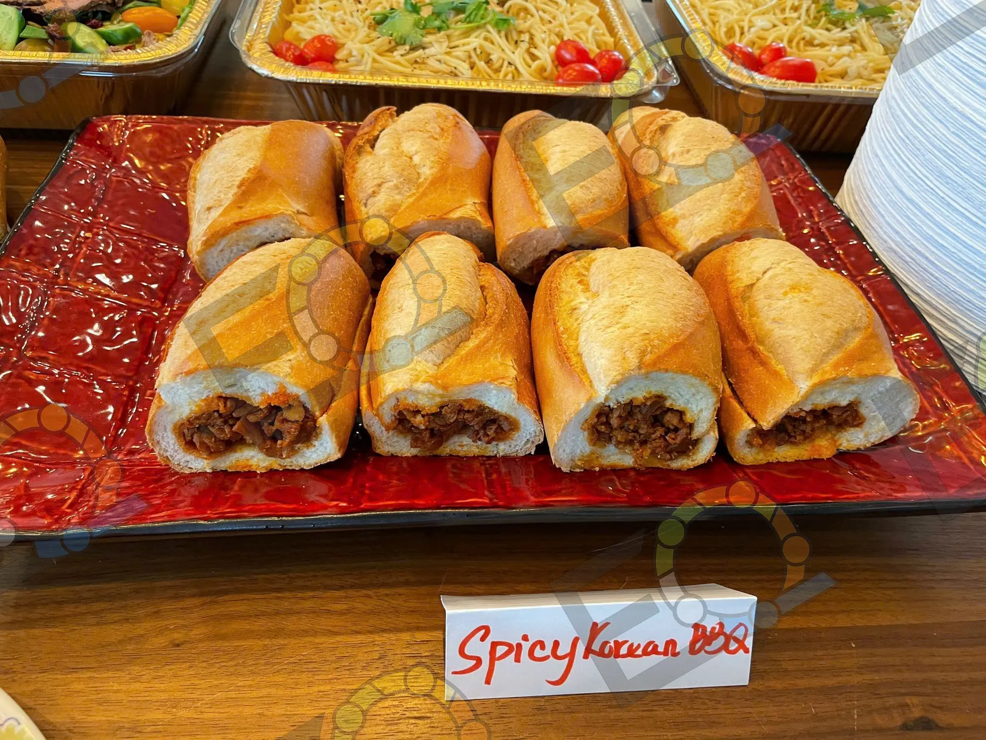 Banh mi filled with Korean barbecue, labelled for a buffet