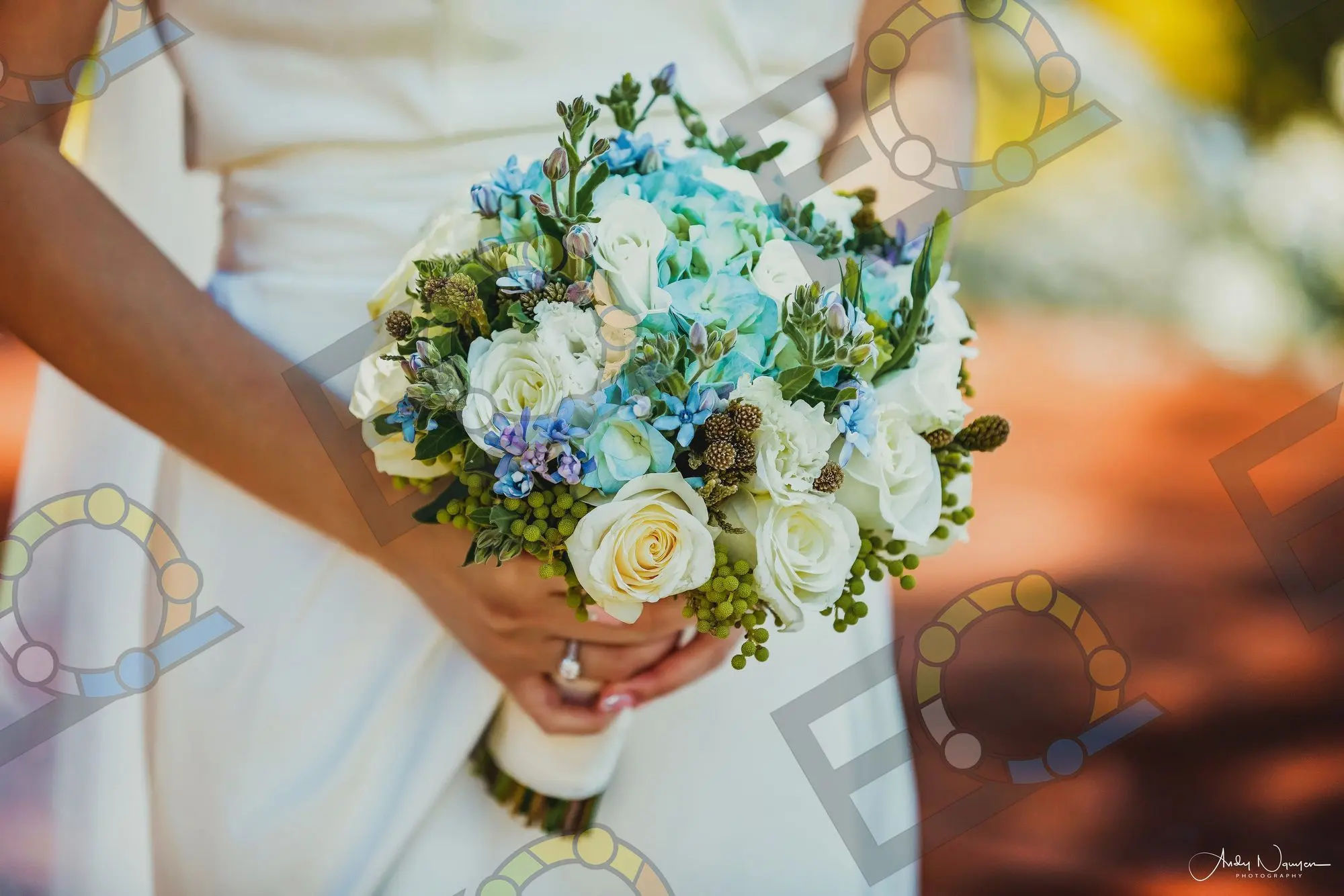 A bridal bouquet of blue and white blooms
