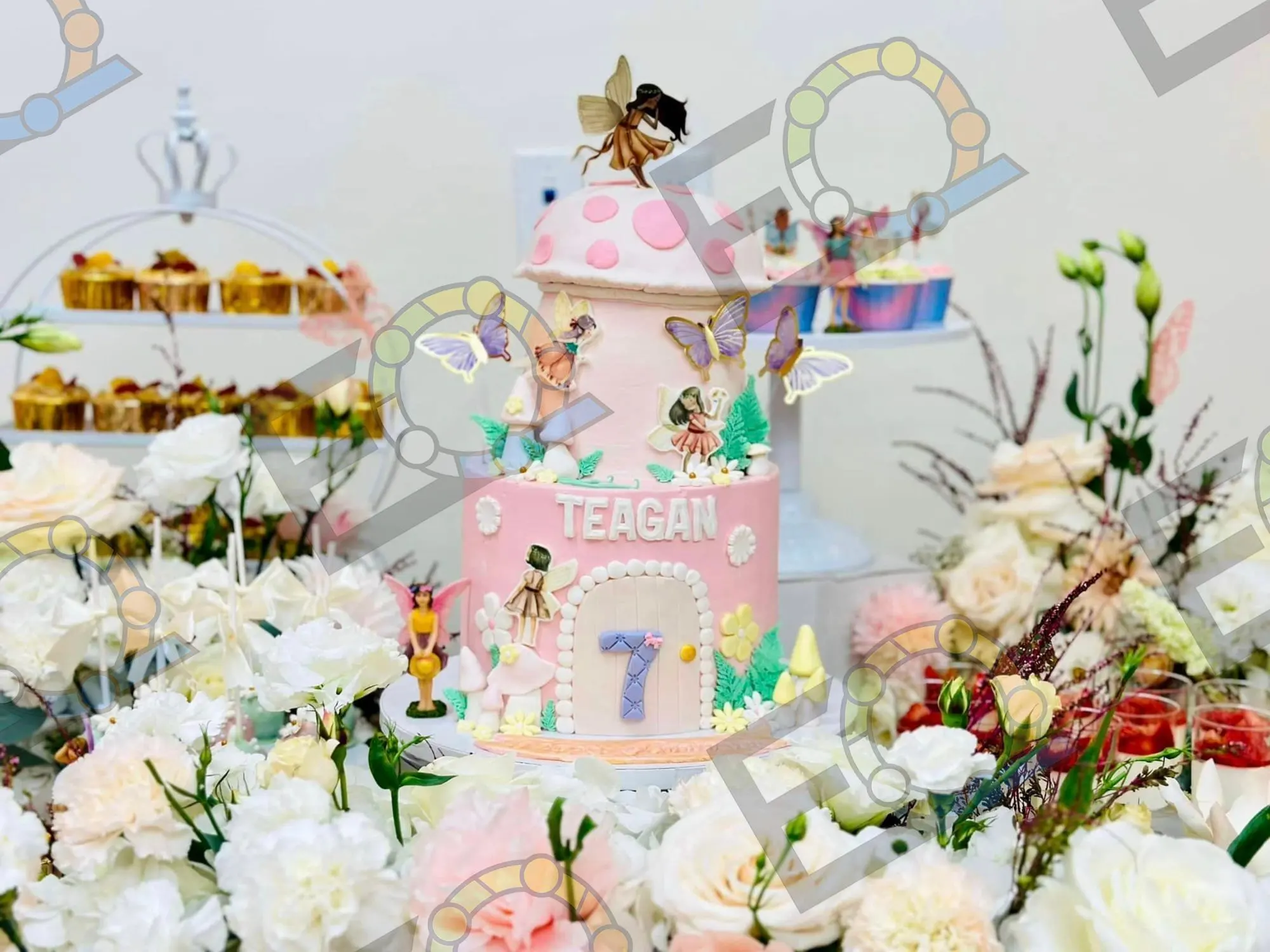 Fairy garden birthday cake with dessert stands