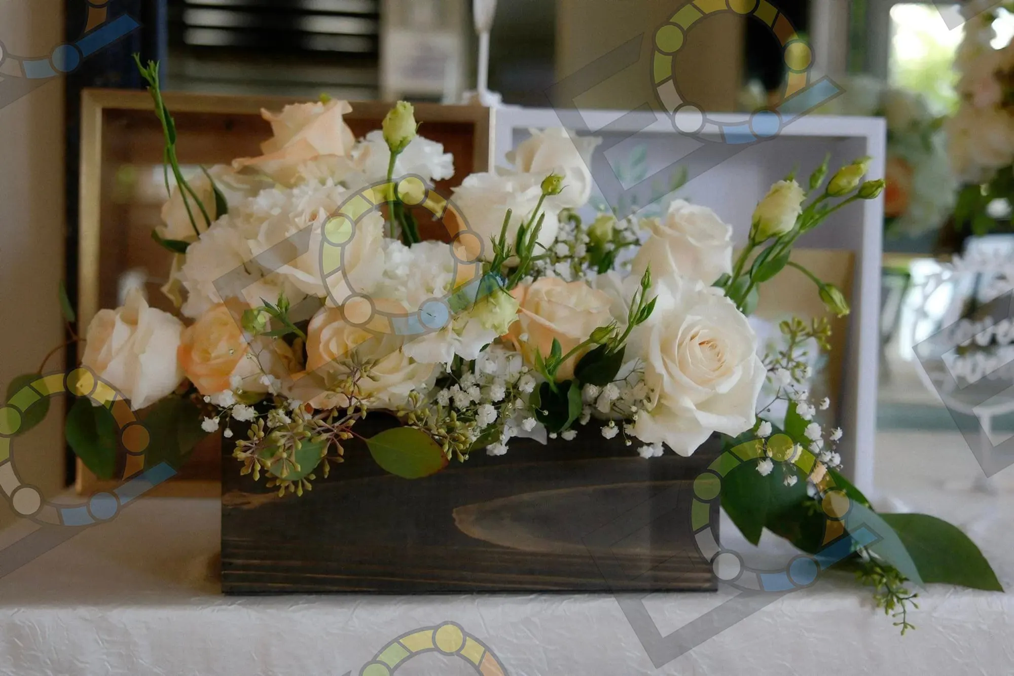 Cream and blush floral arrangement in soft light