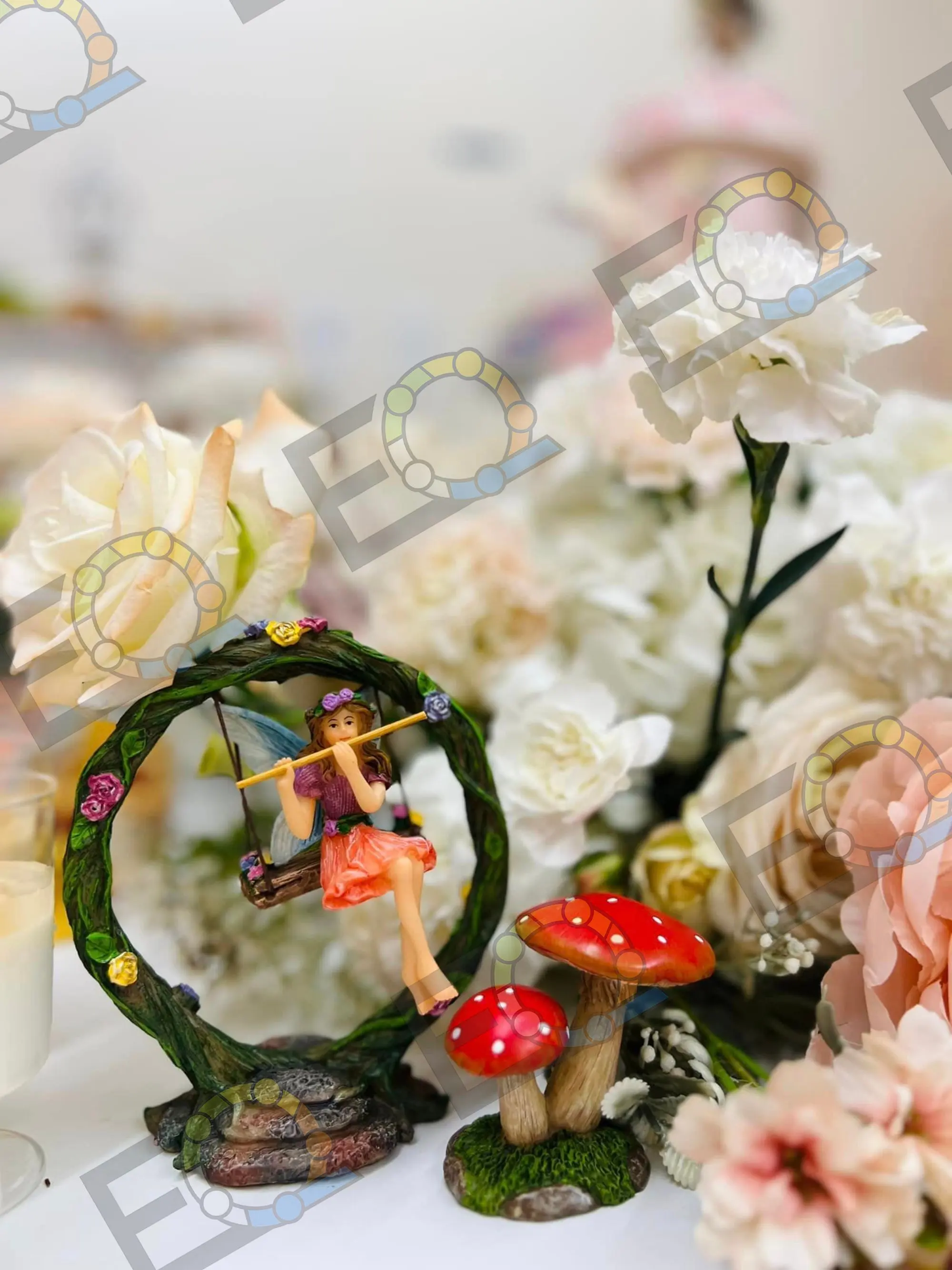 Fairy garden floral detail with white blooms and toadstools