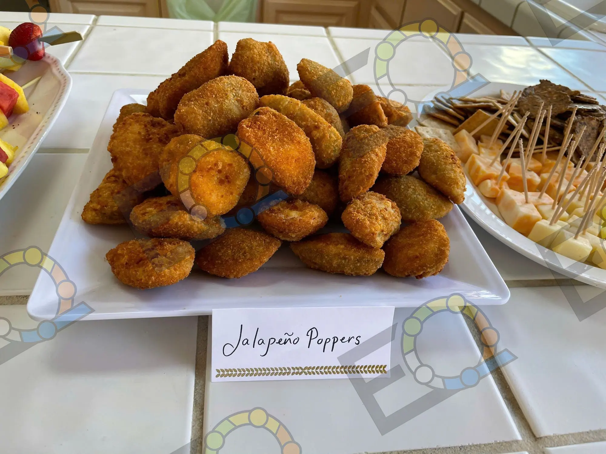 A plate of jalapeno poppers labelled for a buffet