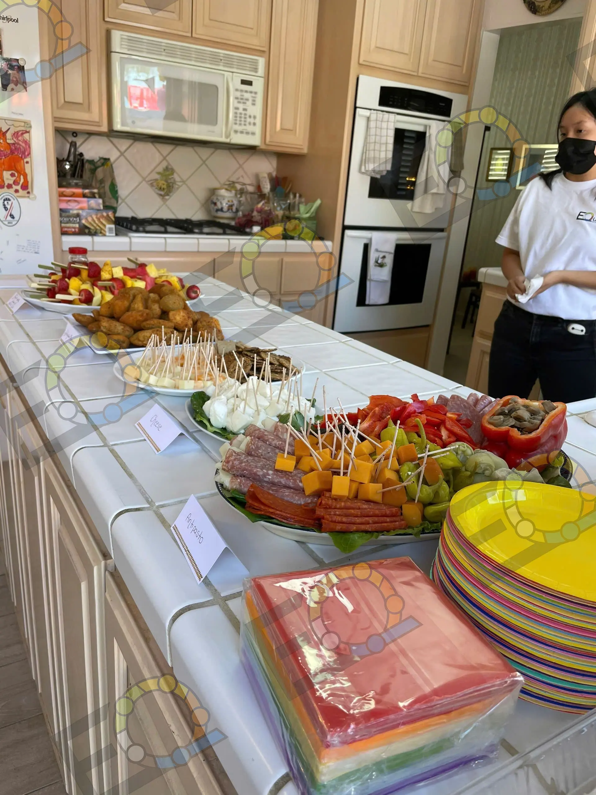 Catering laid out along a kitchen counter before service