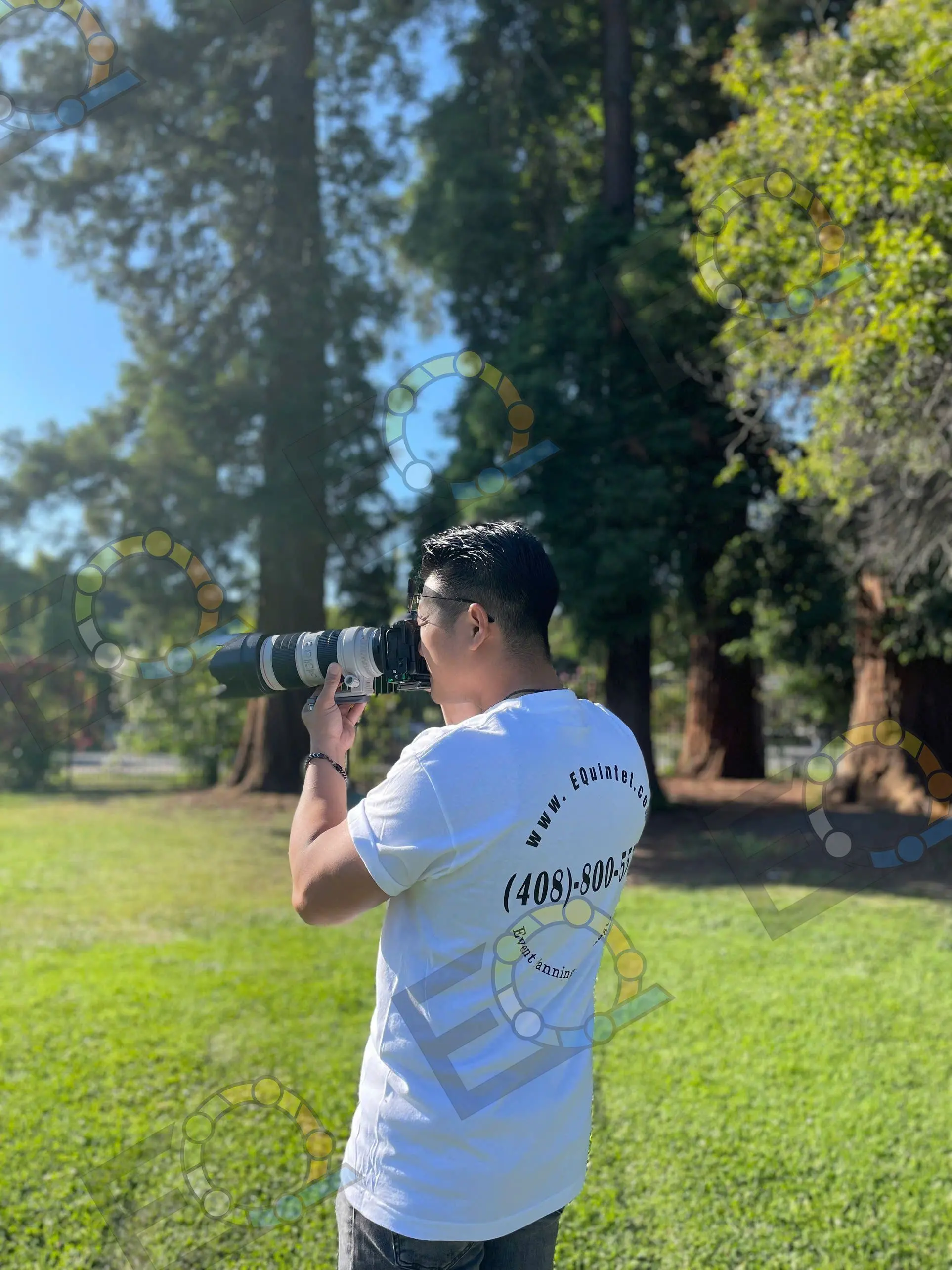 A photographer working at an outdoor event