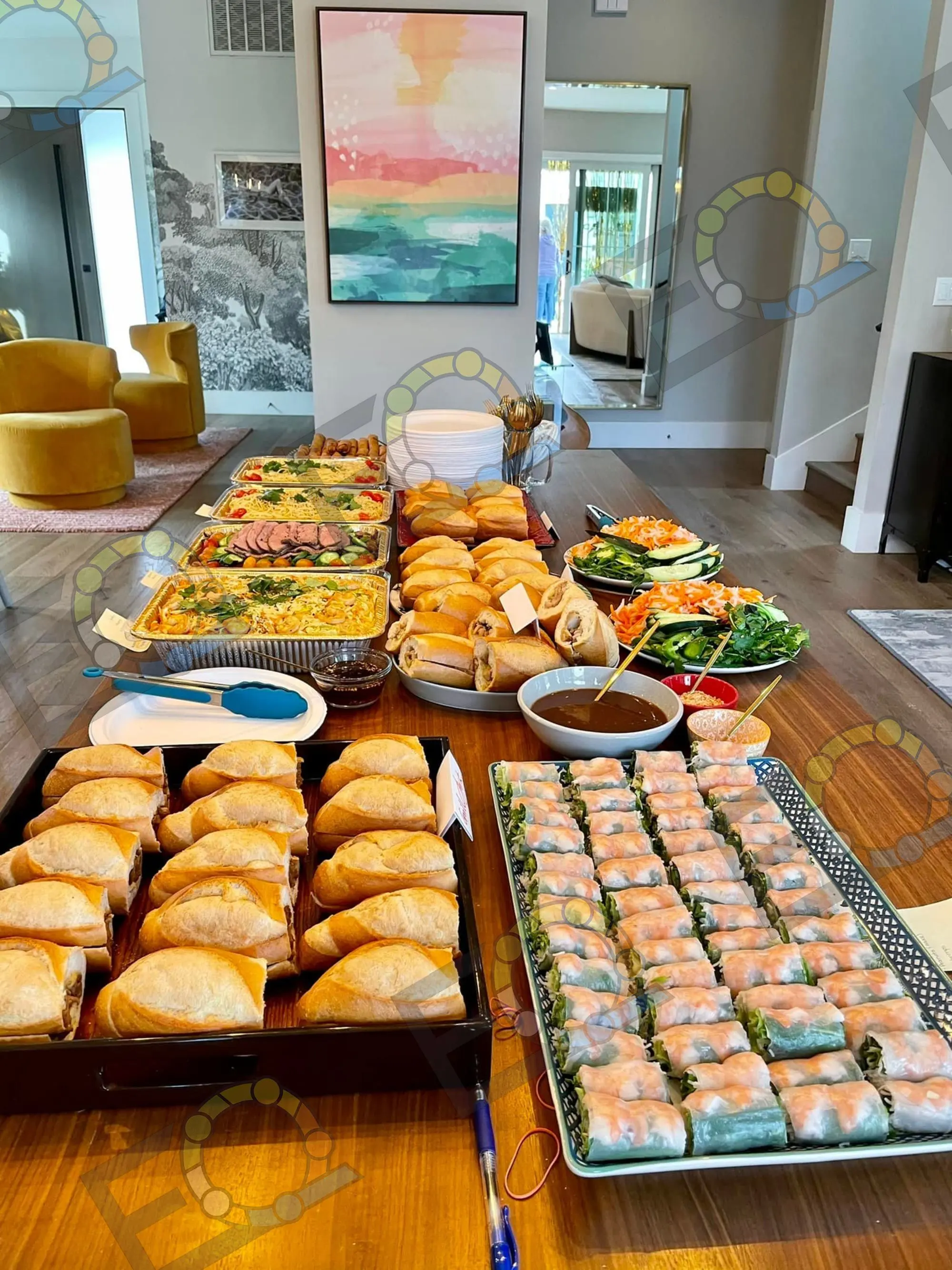 Catering buffet laid out with warm dishes and platters