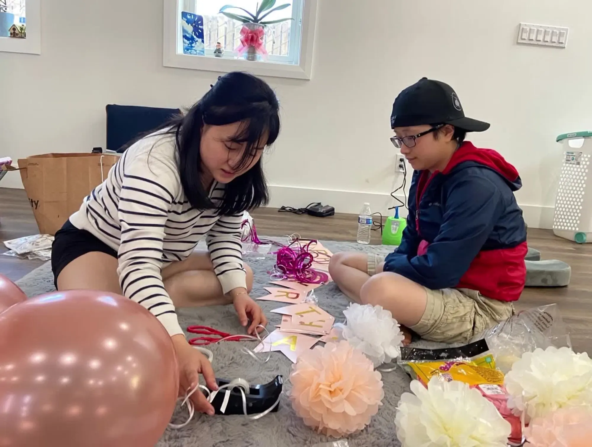 The EQuintet team assembling decor before an event